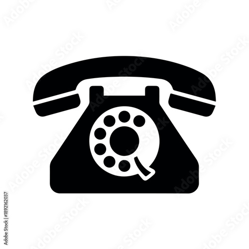 A solid black silhouette of a traditional rotary telephone icon is depicted, representing classic communication and vintage technology.