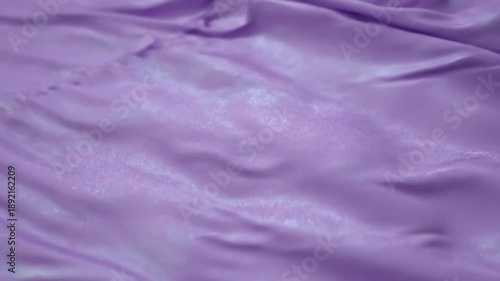 Abstract Silk Dance An artistic, close-up perspective of the fabric's mesmerizing fluid motion and iridescent light interaction.