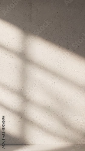 Subtle Architectural Definition Highlighting how soft, moving light subtly reveals and enhances the textures and forms of interior architecture.