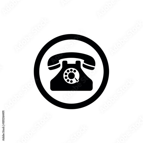 A classic black rotary telephone icon encased in a circle, representing traditional communication, customer service, and direct contact methods.