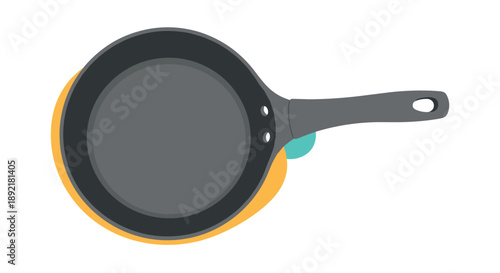 Simple top view of a classic black frying pan with a handle placed on a vibrant orange and yellow circular background.