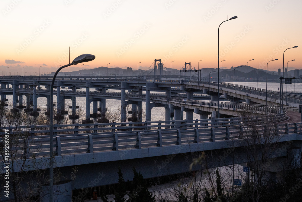 Naklejka premium Xinghai Bay Bridge and Coastal Road in Dalian, China