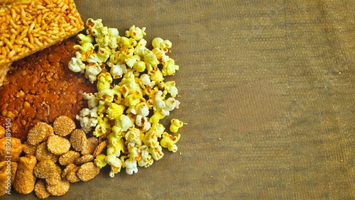 happy lohri festival template. lohri sweets such as popcorn gajak chikki made of jaggery peanuts. lohri festival stock. creative ideas.isolated punjabi sweets in a plain background. isolated popcorn i
