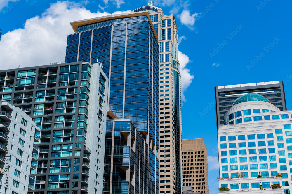 Fototapeta premium Cityscape of skyscraper building in business district. City architecture of skyscraper. City building cityscape view. Skyscraper cityscape. Modern city downtown. Business city