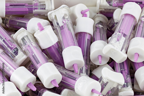 Medical scarifier, in an open box. Automatic lancet scarifier for painless blood sampling. Blood test.