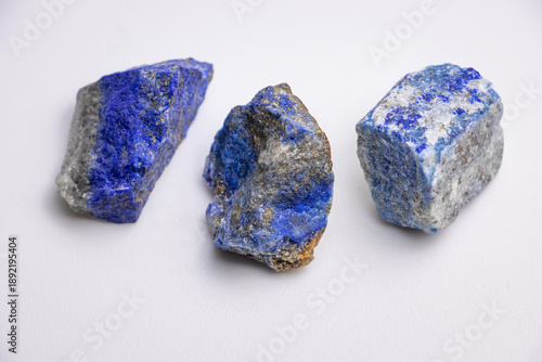 Lapiz lazuli, natural blue stones with iron pyrite inclusions and calcite veining
