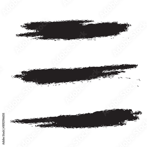 Set of three black grunge brush strokes on a white background.