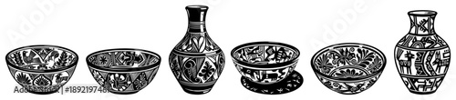 Traditional ceramic pottery set including bowls and vases with ethnic ornaments