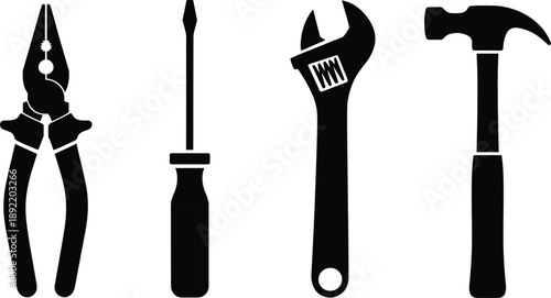 Black Silhouettes of Essential Hand Tools Set Including Pliers Screwdriver Adjustable Wrench and Hammer for Construction Home Repair DIY and Maintenance Projects