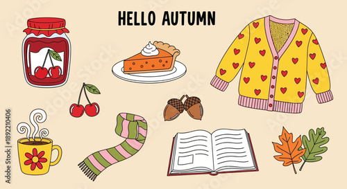 Autumn scene with sweater, book, pie, and mug on table indoors