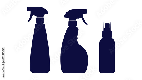 Three dark blue spray bottles on a white background for cleaning