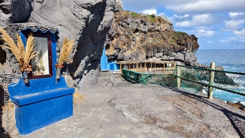 Rock dwellings on the cliffs off the coast of La Palma Island, Canary Islands