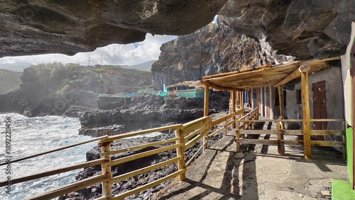 Rock dwellings on the cliffs off the coast of La Palma Island, Canary Islands