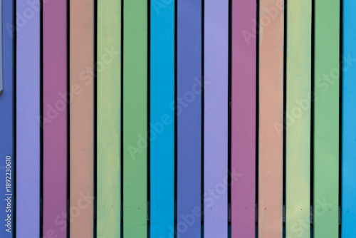Pastel colors painting vertical wooden planks background