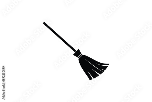 Black silhouette of a broom on a white background