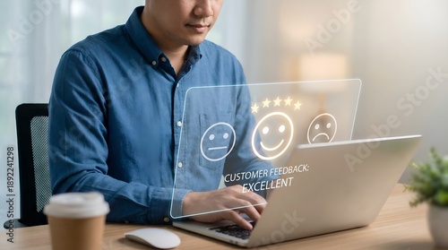 Young Man Giving Excellent Customer Feedback Online Using Laptop with Holographic Interface