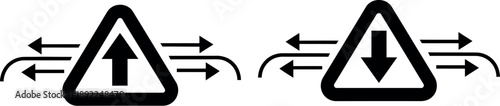 Two triangle signs with arrows indicating direction