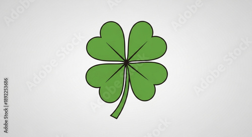 Lucky green four leaf clover on white background symbolizing good fortune and st patrick's day