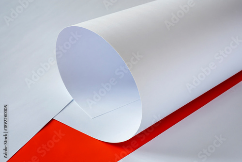 A1 sheets of paper on an orange background.