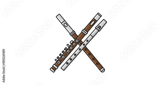 Two traditional brown and silver flutes crossed over each other on white background musical instrument concept