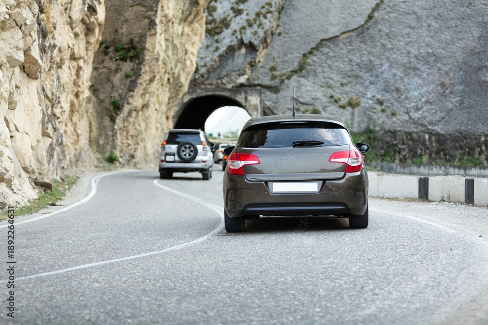 Obraz premium Car driving stunning mountain road background.