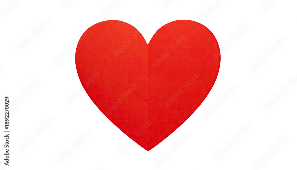 Fototapeta premium A vibrant red heart shape against a stark black background with a smaller heart detail