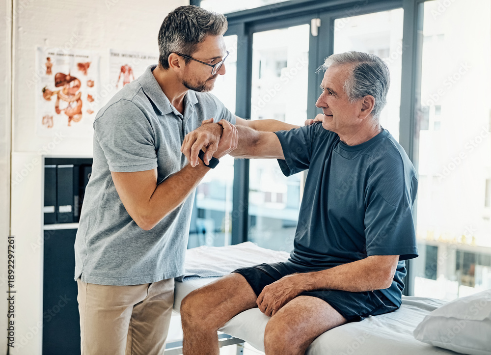 Obraz premium Senior man, physiotherapist and stretching arm for assessment, mobility and injury recovery. Mature person, elderly patient and helping with sore shoulder, physical therapy and muscle rehabilitation