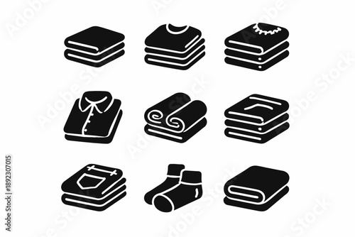 Set of nine black and white clothing icons including shirt, towels, and socks