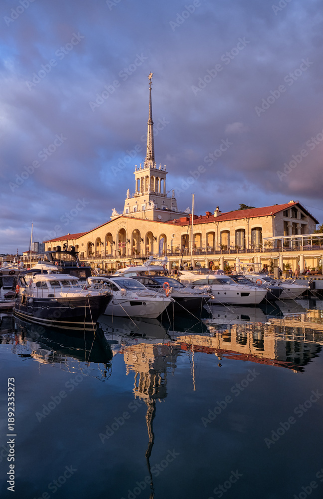 Fototapeta premium The Marine Terminal building of Sochi sea port at sunset. Sochi. Krasnodar Krai, Russia