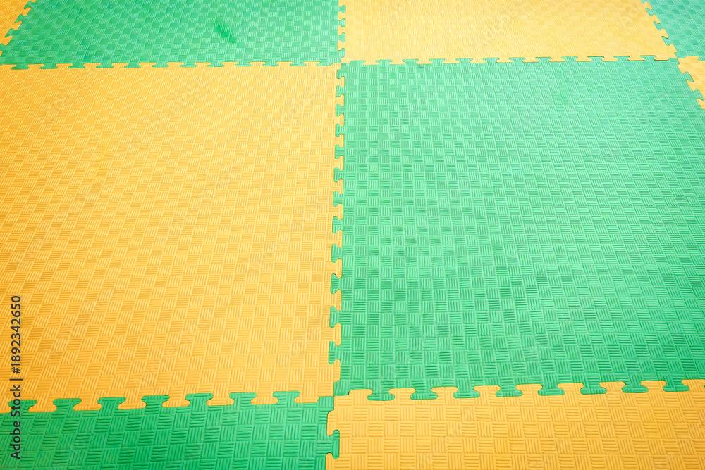 Fototapeta premium Interlocking EVA Foam Mats Form Modular Flooring Pattern