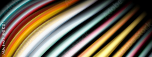 Abstract colorful lines create dynamic diagonal pattern. Bright hues blend into darkness. Modern design element.