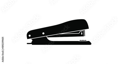 A stark black silhouette of a standard office stapler is prominently displayed against a clean white background silhouette high quality