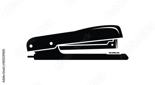 A stark black silhouette depicts a common office stapler showcasing its functional design and simple form silhouette high quality professional