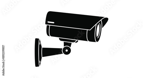 A stark black silhouette of a modern security camera mounted on a wall representing surveillance and technological monitoring silhouette