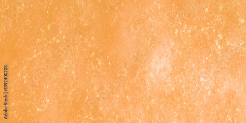 Orange terracotta textured background with distressed plaster effect with organic cracks and distressed details, perfect for Mediterranean style designs.