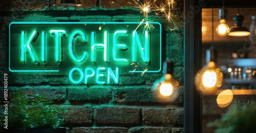 Bright neon kitchen sign illuminates brick wall. Warm lights glow, suggesting inviting restaurant atmosphere. Festive sparks add charm.