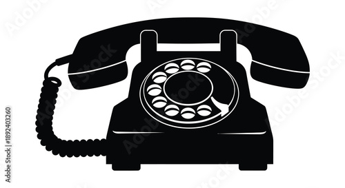 A striking black silhouette depicts a vintage rotary telephone a relic of communication history in stark contrast to white background silhouette
