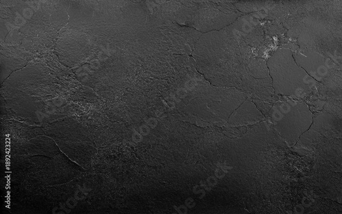 Dark cement wall in retro concept. Black concrete background for wallpaper or graphic design. Blank old plaster texture. 