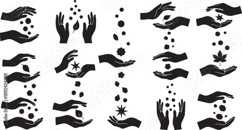 Black silhouettes of hands releasing particles and objects freely
