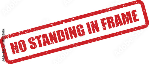 A distinct red grunge rubber stamp text clearly indicates NO STANDING IN FRAME on a bright white surface