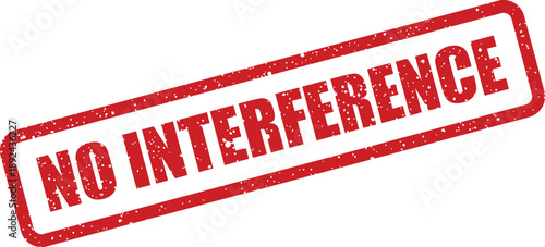 A grunge textured red rectangular rubber stamp presenting a clear directive to avoid any interference