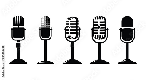 A collection of five vintage microphones in varying styles displayed in a row as a black silhouette