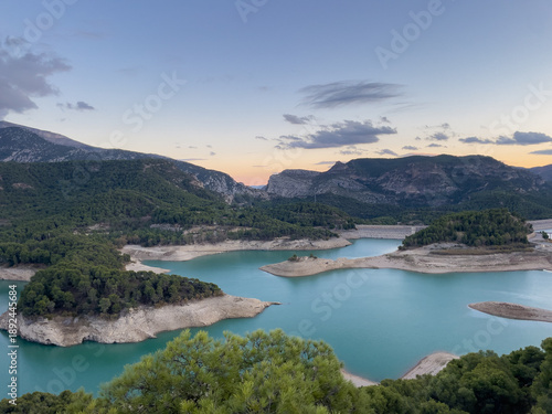 Landscape View of Guadalhorce Dam Affected by Water Shortage at Sunset, Andalusia, Spain