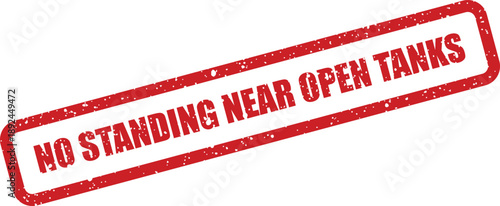 A textured red rubber stamp with white speckles warns against standing too close to open tanks