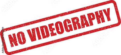 A vivid red rubber stamp clearly displays the message NO VIDEOGRAPHY on a plain white surface
