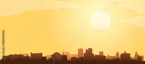 Golden yellow panoramic poster of the city skyline with misty background buildings and clouds of ANCHORAGE, UNITED STATES