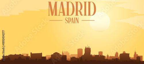 Golden yellow panoramic poster of the city skyline with misty background buildings and clouds of MADRID, SPAIN