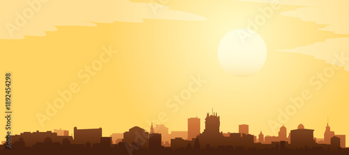 Golden yellow panoramic poster of the city skyline with misty background buildings and clouds of MADRID, SPAIN