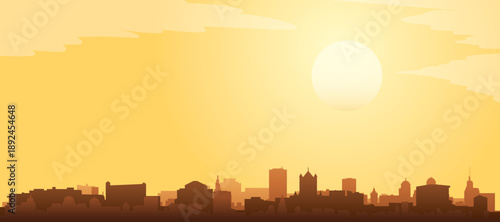 Golden yellow panoramic poster of the city skyline with misty background buildings and clouds of GHENT, BELGIUM
