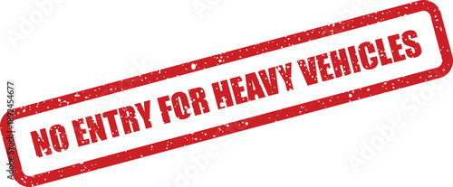 Grungy red rubber stamp with the clear message no entry for heavy vehicles on white